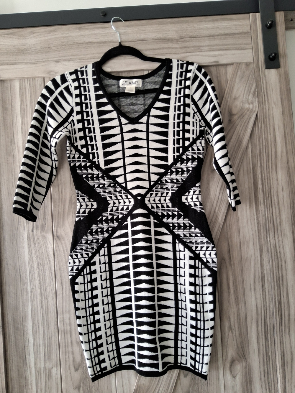 Say What? Black and White Geometric V‑Neck Bodycon Dress